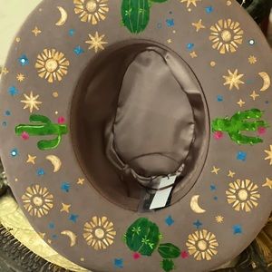 SOLD OFF POSH. Hi! I’m selling a gorgeous “Riddle Hat.”